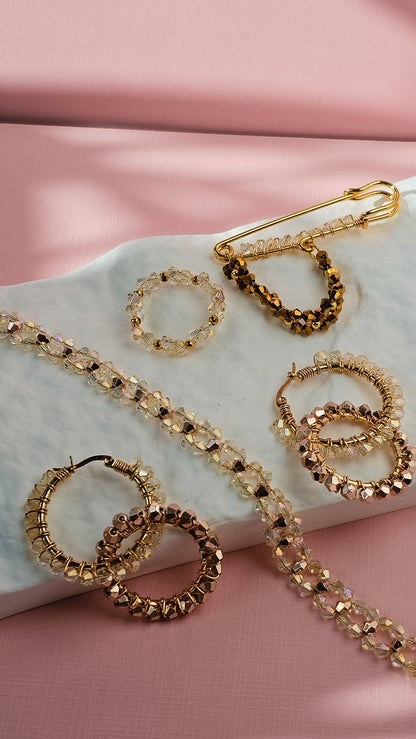 Gilded Maia Collection